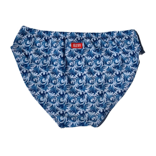 Blue and white patterned swim briefs with 'Klevy' branding on a light gray background