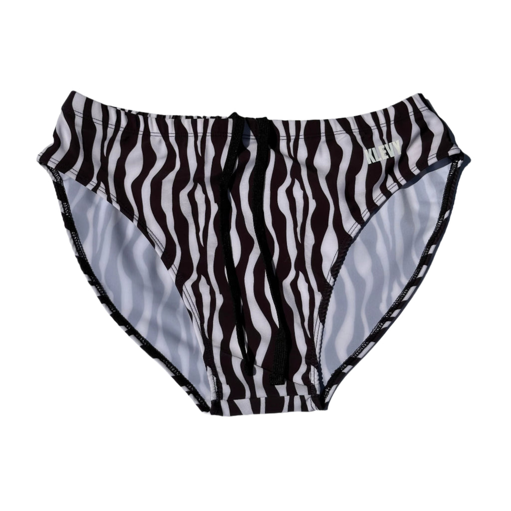 Black and white striped swim bottoms with 'Klevy' branding on a white background