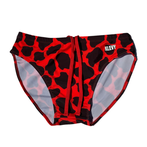Red and black cow print swim bottoms with 'Klevy' branding on a white background