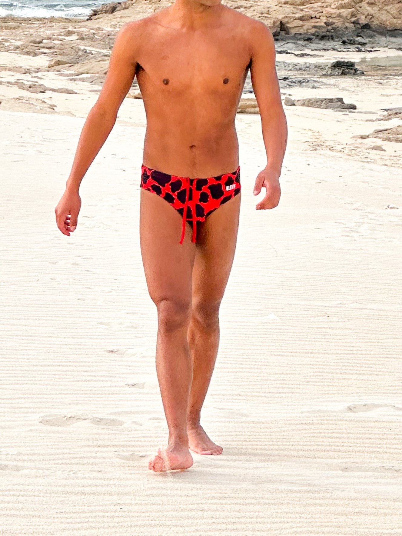 Men's red lava print swim brief   بيكيني مايوه رجالي سبيدو كلوت احمر